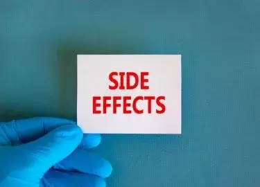 Saxenda lawsuit: Side effects symbol. White note with words Side effects, beautiful blue background, doctor hand in blue glove. Medical and side effects concept.