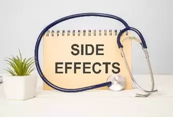 Side Effect word with stethoscope on wooden background as medical concept