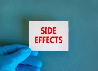 Zepbound lawsuit: Side effects symbol. White note with words Side effects, beautiful blue background, doctor hand in blue glove. Medical and side effects concept.