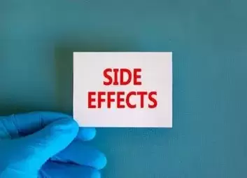 Saxenda lawsuit: Side effects symbol. White note with words Side effects, beautiful blue